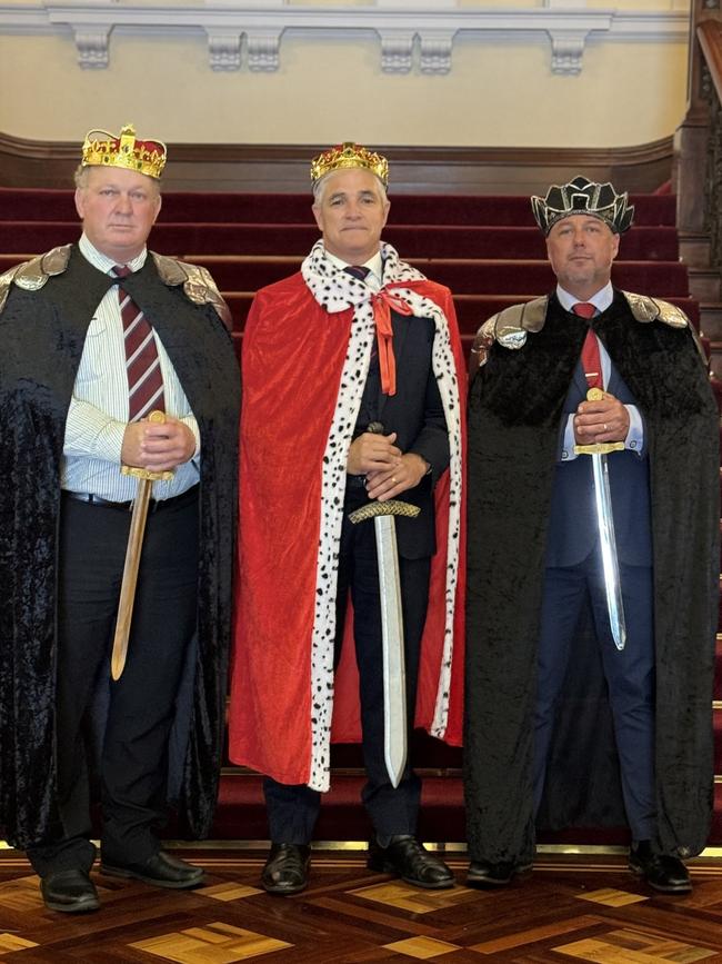 Katters Australian Party MPs Shane Knuth, Robbie Katter and Nick Dametto dressed as kings at Queensland parliament.