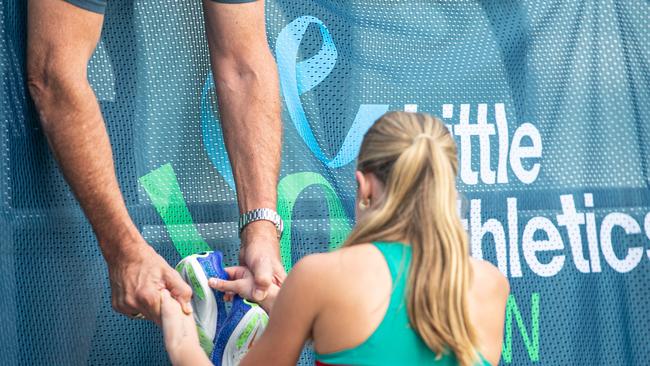 Siena Novak from South Eastern is congratulated by family Picture: Julian Andrews