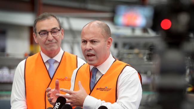 Premier Steven Marshall (left) and federal Treasurer Josh Frydenberg at Bickford’s Salisbury factory on Tuesday. Picture Dean Martin