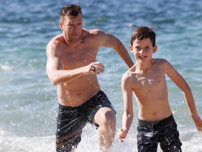 DAILY TELEGRAPH FEBRUARY 5, 2023: Ben Ford is helping his his son Drake 9, learn a little about investing and saving his money. Picture: NCA NewsWire / David Swift