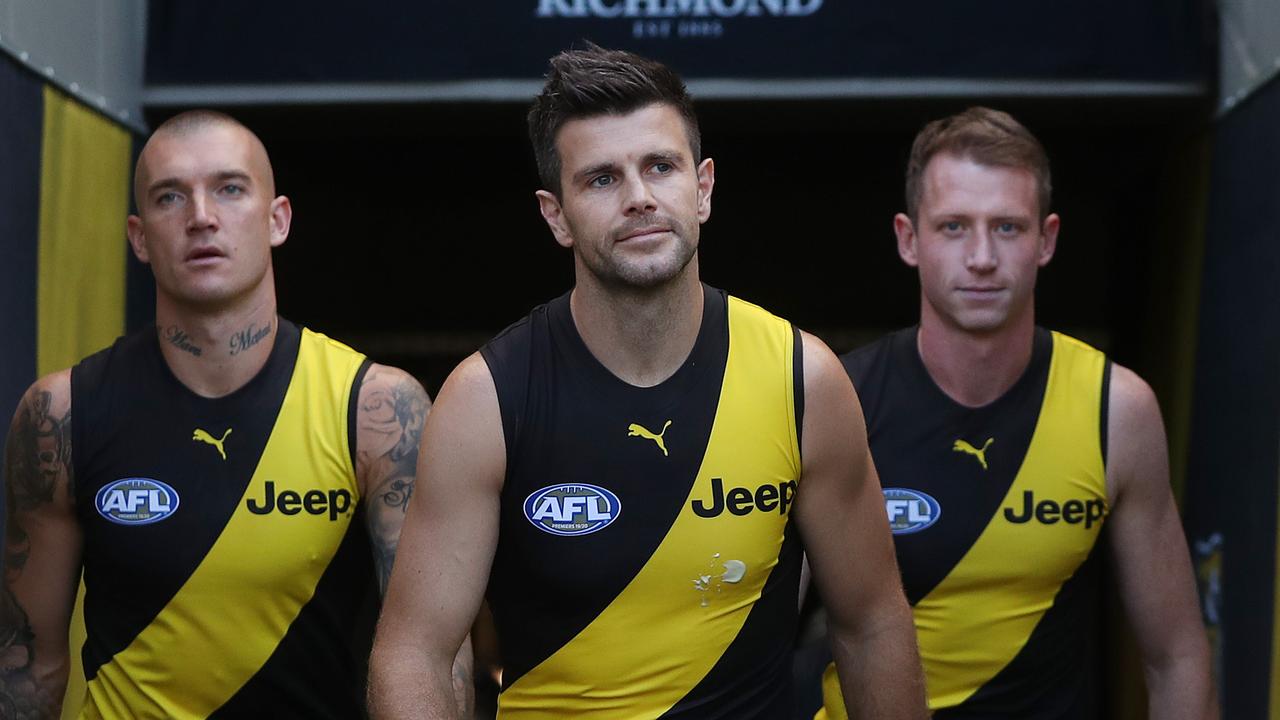 Trent Cotchin leads the Tigers onto the MCG.