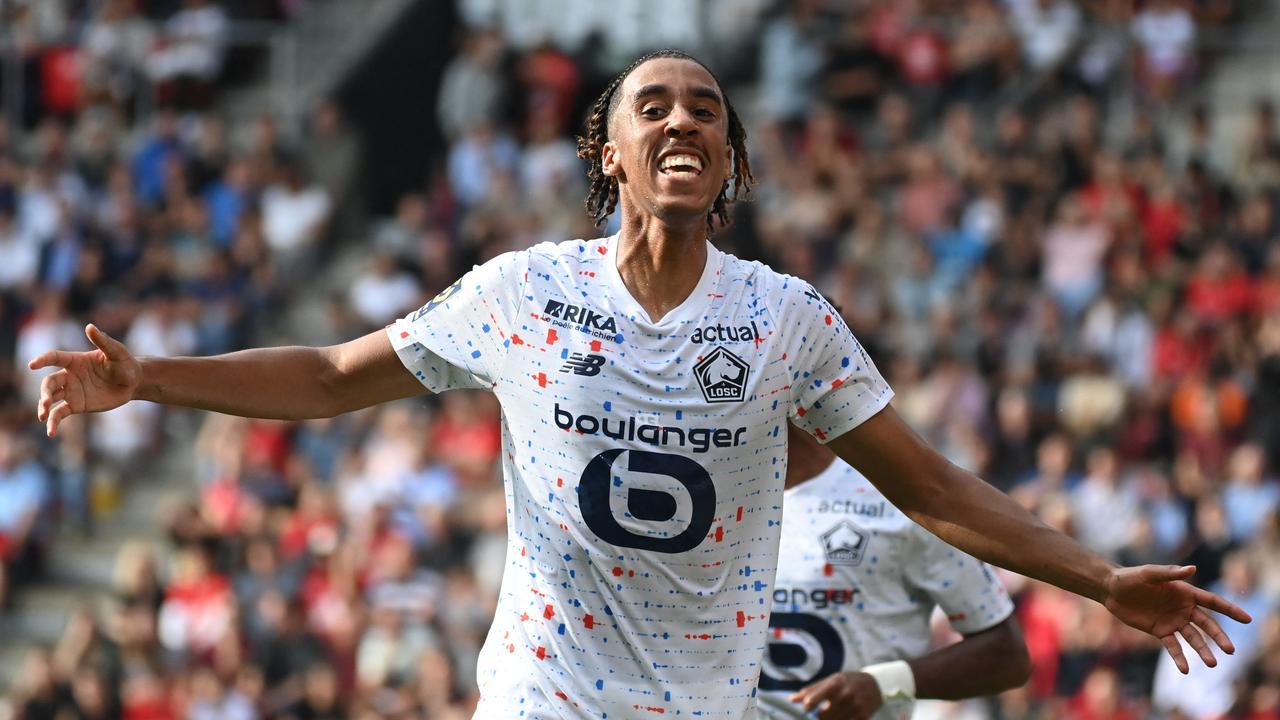 (FILES) Lille's French defender #15 Leny Yoro celebrates after opening the scoring during the French L1 football match between Stade Rennais FC and Lille LOSC at The Roazhon Park Stadium in Rennes, western France on September 16, 2023. Young French central defender Leny Yoro, one of last season's Ligue 1 standouts for Lille, has signed a five-year contract with Manchester United, with an option for a further year, the two clubs announced on July 18, 2024. (Photo by Sebastien SALOM-GOMIS / AFP)