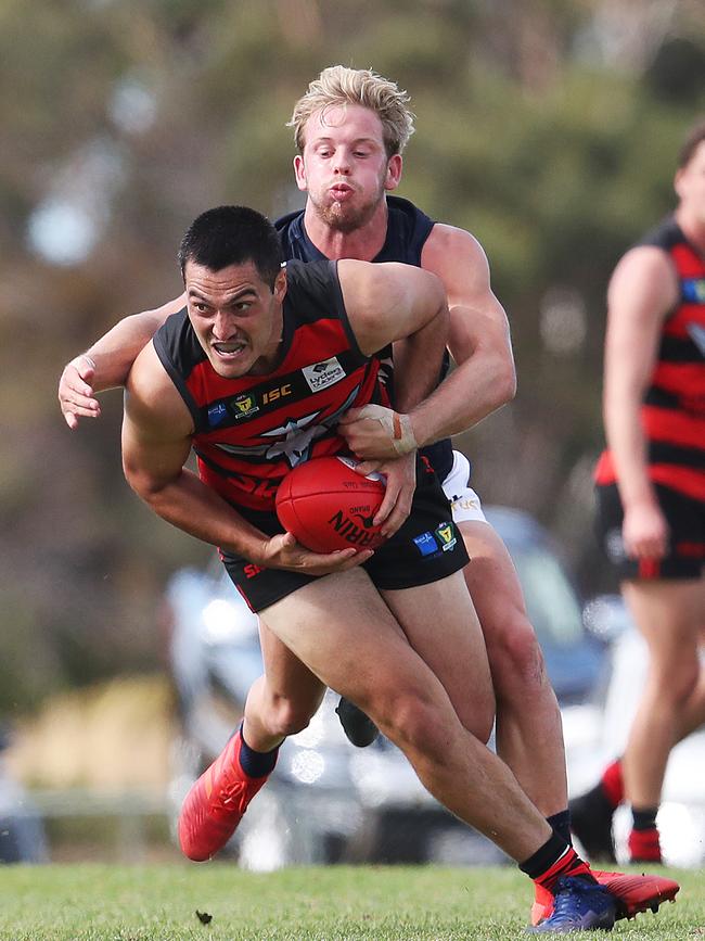 Phillip Bellchambers of Lauderdale and Jack Donnellan of Launceston in Saturday’s Lauderdale V Launceston Tasmanian State League match. Picture: NIKKI DAVIS-JONES