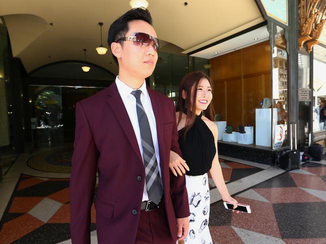 Mr Mehajer’s friend Shi Lao and girlfriend Julia leave Downing Centre Local Court.