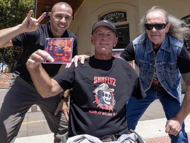 15th February, 2022:  owner Ash Coulls, super fan Sparky and BarflyÃs manager Mark Mark Barton at the British Hotel in Port Adelaide is leading the charge to revive live music and boost pubs in the area. Picture: Kelly Barnes