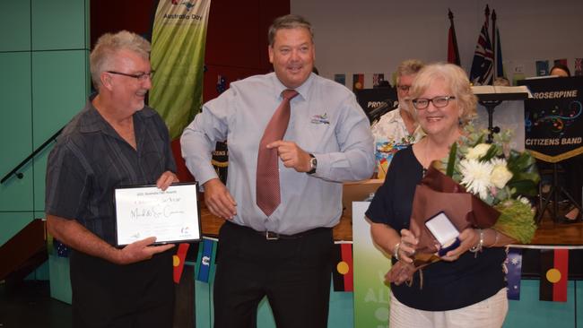 Whitsunday Mayor Andrew Willcox (centre) with 2021 Citizens of the Year for Airlie Beach, Cannonvale, Proserpine and surrounds Mark and Sue Connors. Photo: Elyse Wurm