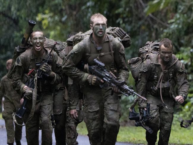 A section from the 3rd Battalion, Royal Australian Regiment during the final pack march for the Duke of Gloucester Cup 2024 at the Jungle Training Area in Tully. *** Local Caption *** The Duke of Gloucester Cup is an annual competition to test the warfighting skills of infantry soldiers from the Royal Australian Regiment. This year, the Duke of Gloucester Cup was held at the Townsville Field Training Area and Tully Training Area. Competitors are tested individually and as part of a team across a range of skills under arduous conditions, including marksmanship, reconnaissance, planning and executing section attacks and close quarters fighting.   Along with the Duke of Gloucester Cup, five other trophies are awarded: Sir Arthur MacDonald Trophy for best foundation warfighting skills; Gurkha Trophy for best live-fire shooting; Royal Ulster Rifles Trophy for best falling plate shooting; OSCMAR Trophy for best battle endurance; and the DSM Roche CSC Memorial Cup for best individual soldier. The Duke of Gloucester Cup was created by Prince Henry, Duke of Gloucester, in 1946, while serving as the Governor-General of Australia.  DoG Cup is planned and executed by the School of Infantry, with support from 3rd Brigade and Combat Training Centre. PHOTO: LSIS Nadav Harel