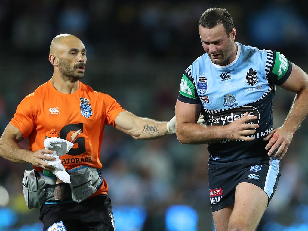 Cordner is helped from the field.