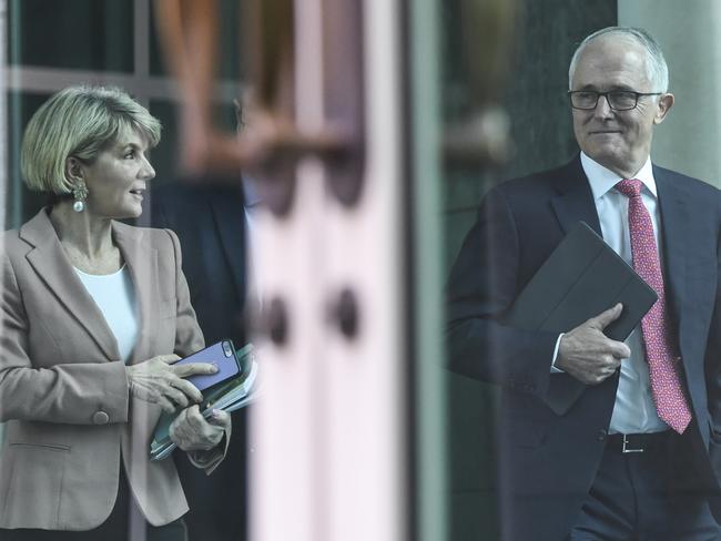 Prime Minister Malcolm Turnbull and Foreign Minister Julie Bishop arrive for the party room meeting at Parliament House in Canberra. Picture: Lukas Coch/AAP