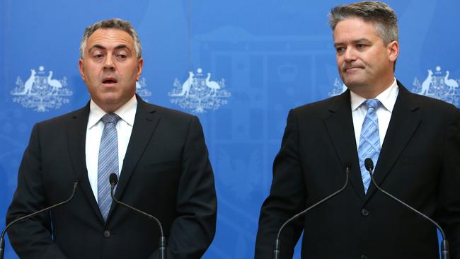 House of pain ... Treasurer Joe Hockey and Finance Minister Mathias Cormann holding a media conference on the release of the Commission of Audit at Parliament House in Canberra. Picture: Kym Smith