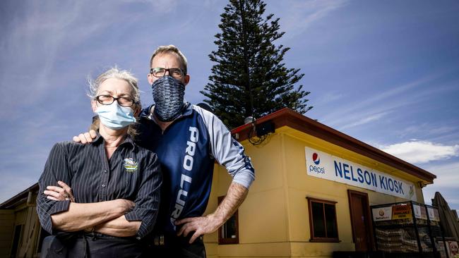 Nelson Kiosk and Post Office operators Andrea Winfield and Paul Singleton live on the SA side of the border, and work on the Victorian side. Picture: Nicole Cleary