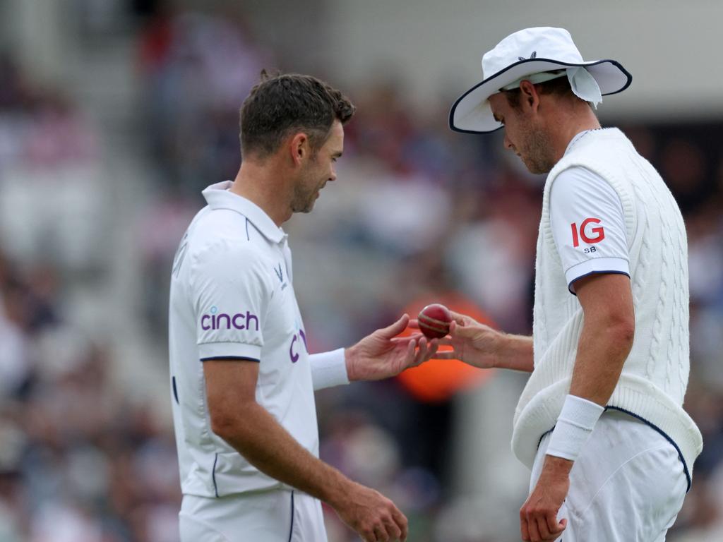 Jimmy Anderson and Stewart Broad examine the ball. Picture: AFP