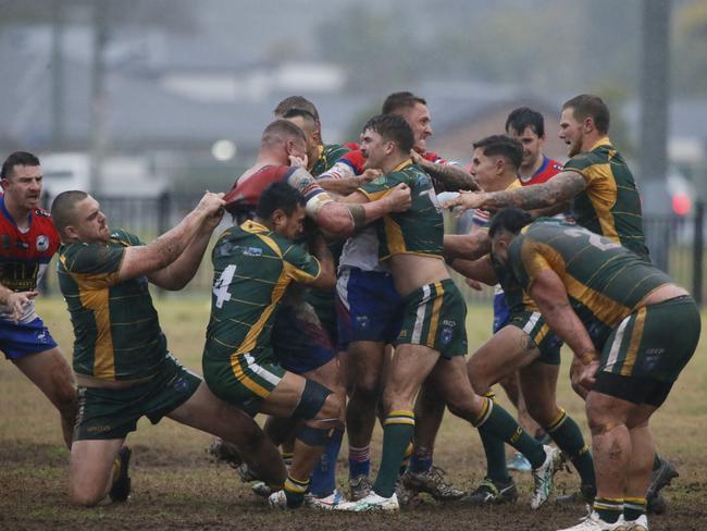 Let's dance. Windsor and Emu Plains embrace the top of the table clash. Picture Warren Gannon Photography