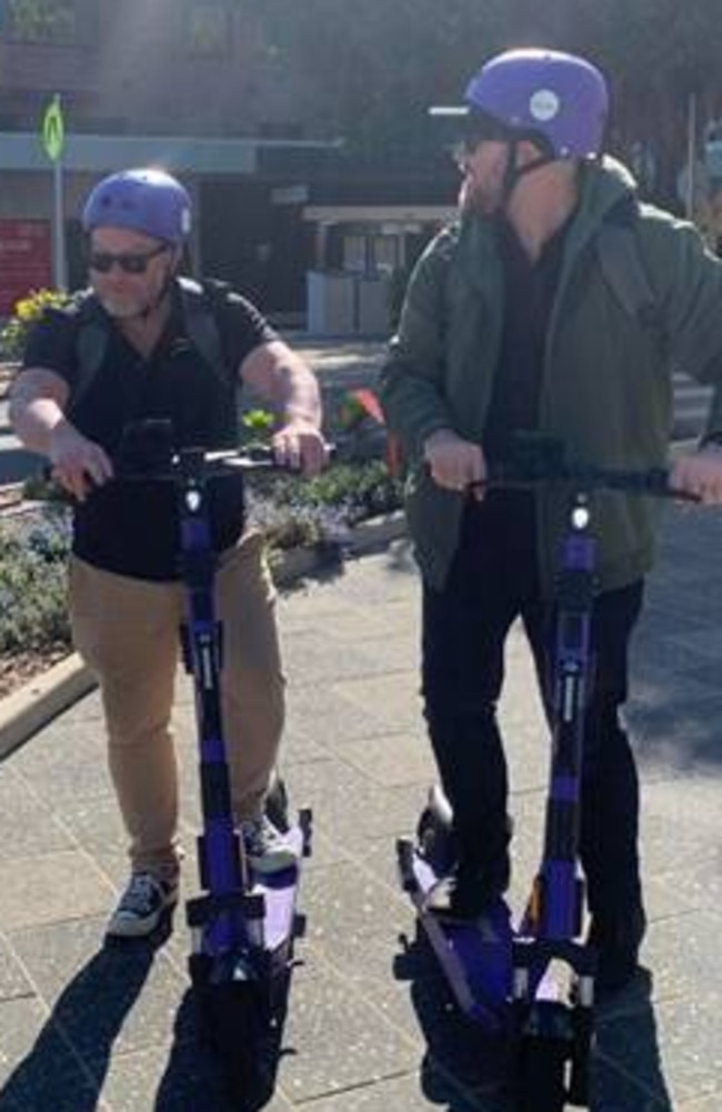 Triple M Mackay and Whitsunday presenters Dave Peters and Jay Shipston trial the new Beam e-scooters in Mackay. Picture: Contributed