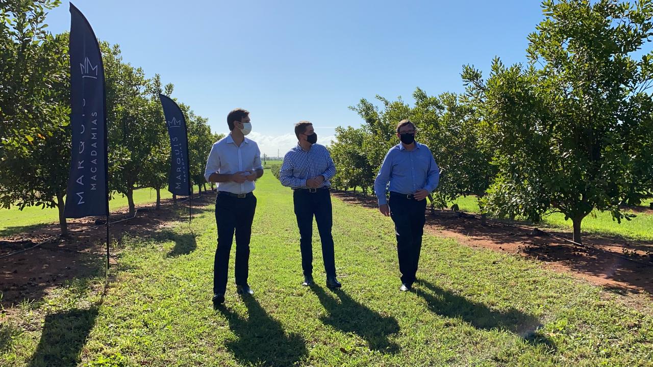 Bundaberg MP Tom Smith, Treasurer Cameron Dick and Marquis Macadamias CEO Larry McHugh discuss the expansion to the facility.