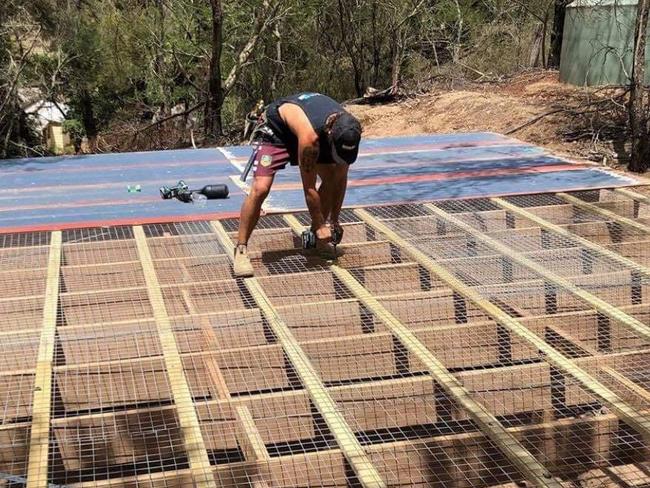 Players from the Newport Breakers helped build new enclosures for orphaned native animals at a wildlife sanctuary near Braidwood. Picture: Supplied