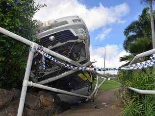 Two men walked away uninjured after a single car rollover on Shute Harbour Rd at Cannonvale this morning. Picture: Claudia Alp