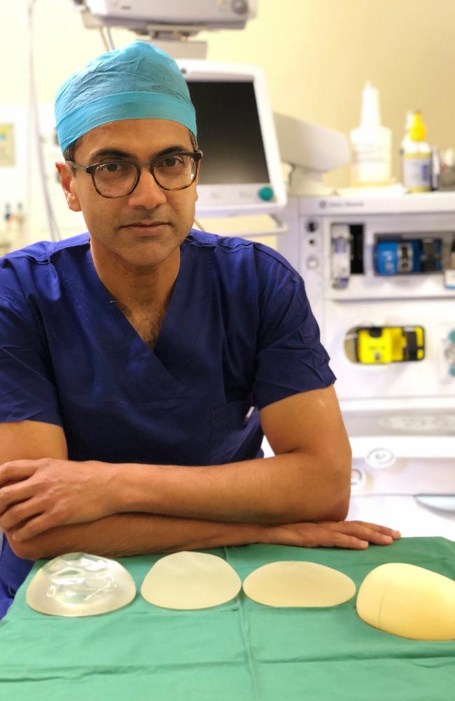 Professor Anand Deva with breast implants implicated in cancer. Picture: Supplied