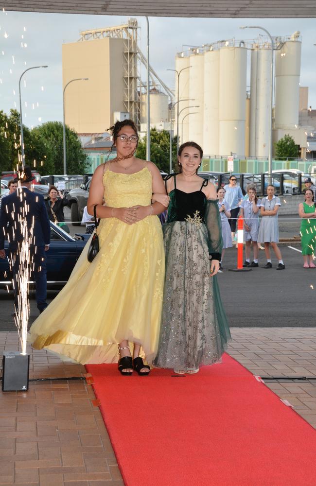 Toowoomba school formals. At the 2023 St Ursula's College formal is graduate Clara Morgan (right) with her partner Paige Moylan. Picture: Rhylea Millar