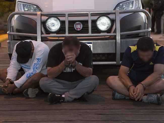 Three men arrested during the raids in Western Australia.