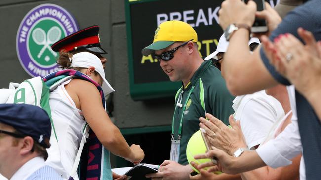 Ash Barty (L) carries herself with class at all times. Picture: Ella Pellegrini