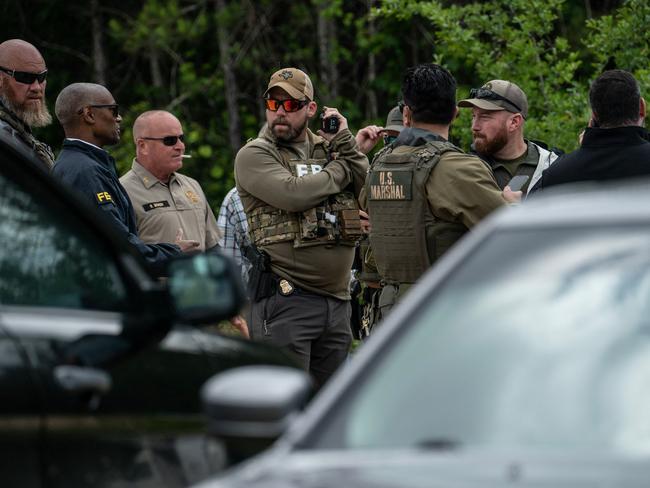 Officers at the scene of the horrific shooting. Picture: Getty Images