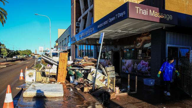 A pile of debris outside a massage and spa business in Taree. Picture: Roni Bintang/Getty Images