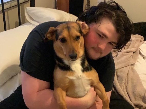 Isaiah Crocker with his companion dog Franklin. Picture: Supplied