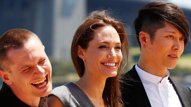 SYDNEY, AUSTRALIA - NOVEMBER 18: (L-R) Jack O'Connell, Angelina Jolie and Miyavi Ishihara share a joke at the photo call of Unbroken at Sydney Opera House on November 18, 2014 in Sydney, Australia. (Photo by Brendon Thorne/Getty Images)