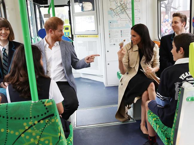 Prince Harry, Duke of Sussex and Meghan, Duchess of Sussex riding on a Melbourne Tram. Picture: Getty