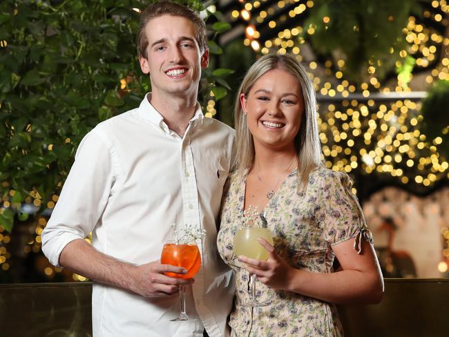 Ruby Madden, 23 and Josh Starr, 21 at Alibi restaurant in Sydney. They are big fans of The Bachelor and have been previously inspired by The Bachelor dates, booking a Cork and Chroma wine and paint session after seeing it in last season series. Picture: Richard Dobson