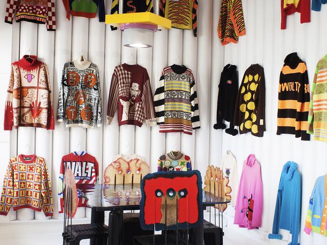 Fashion archivist Octavius La Rosa's collection of Walter Van Beirendonck sweaters hanging inside Dot Comme in Melbourne. Picture: Farfetch