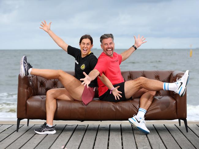 AFLW player Libby Birch and fitness guru Sam Wood are encouraging Aussies to stop being couch potatoes and look after their health. Picture: David Caird