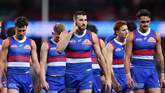 SYDNEY, AUSTRALIA - JULY 13:  Marcus Bontempelli of the Bulldogs and team mates look dejected after the round 18 AFL match between Sydney Swans and Western Bulldogs at Sydney Cricket Ground, on July 13, 2023, in Sydney, Australia. (Photo by Matt King/AFL Photos/via Getty Images)