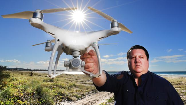 Tweed Shire councillor Reece Byrnes with a drone at Kingscliff. Picture: Scott Powick