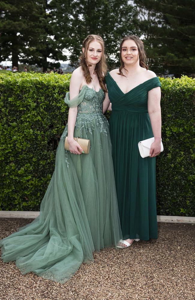 Hannah Kapernick (left) and Mia Roberts at Centenary Heights State High School formal at Picnic Point, Friday, November 15, 2024. Picture: Kevin Farmer