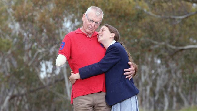 Colin Bailey with daughter Ayumi who helped save his life after a horrific accident. Picture Gary Ramage