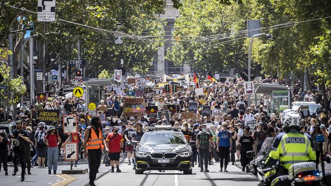 Thousands of people march in Melbourne’s CBD. Picture: Jake Nowakowski