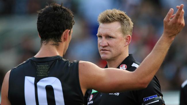 Collingwood coach Nathan Buckley talking to captain Scott Pendlebury on Anzac Day. Picture: Wayne Ludbey