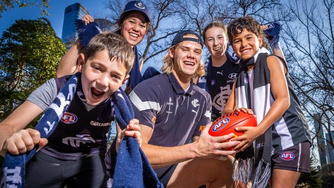 Tom de Koning celebrating finals fever with Freya Sali, Chloe Poore, Gideon Dave and Ariel New to promote. Picture: Jake Nowakowski