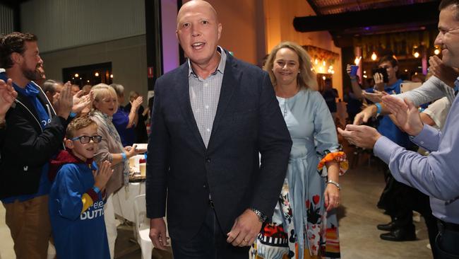 Peter Dutton arrives at his election party in Brendale alongside wife Kirilly. Picture: Zak Simmonds