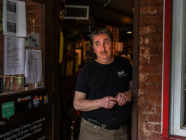 Randy D. Adler looks on as he works at his newly reopened restaurant in Atlanta, Georgia. Picture: AFP