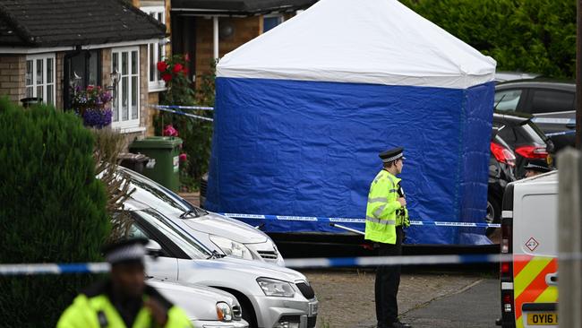 Police officers at a house in Ashlyn Close on July 10, 2024 in Bushey, England. (Photo by Leon Neal/Getty Images)