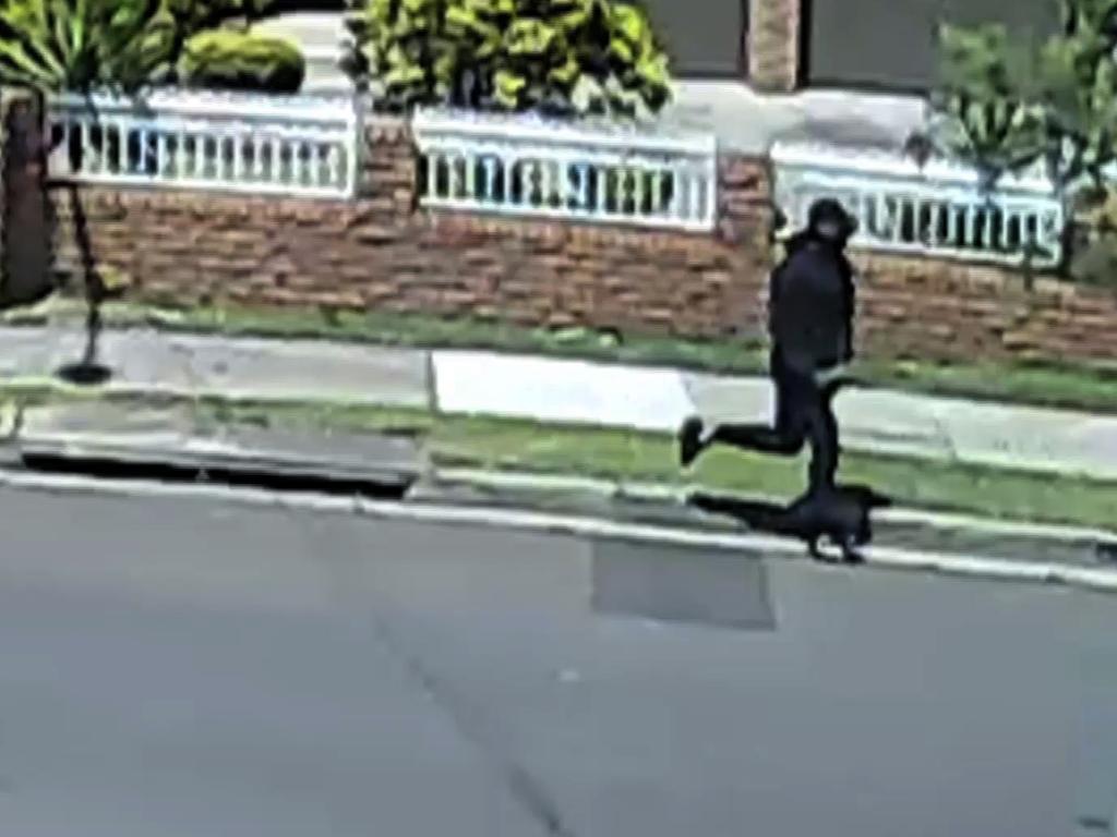 Still image supplied by NSW Police of 2 men suspected of being the shooters of Mahmoud "Mick" Hawi running from the Rockdale scene.