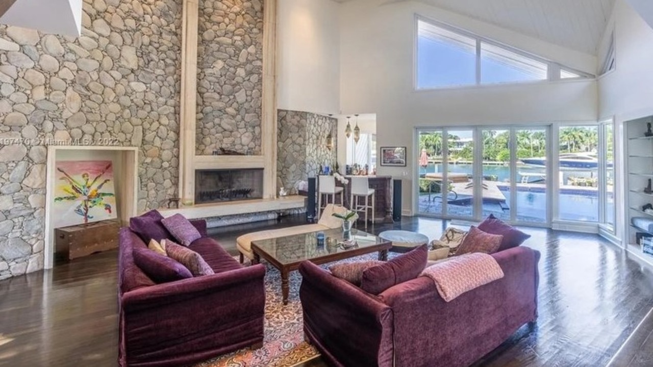 The space features soaring ceilings and floor-to-ceiling windows. Picture: Realtor