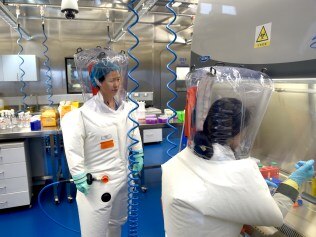 WUHAN, CHINA - FEBRUARY 23 2017: Virologist Shi Zheng-li, left, works with her colleague in the P4 lab of Wuhan Institute of Virology (WIV) in Wuhan in central China's Hubei province Thursday, Feb. 23, 2017.- PHOTOGRAPH BY Feature China / Barcroft Studios / Future Publishing (Photo credit should read Feature China/Barcroft Media via Getty Images)