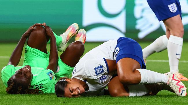 Nigeria's Christy Ucheibe (L) and England'Jessica Carter clash. Picture: AFP