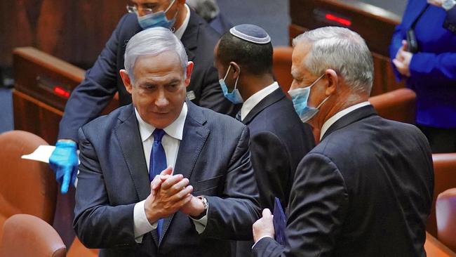 Benjamin Netanyahu and Benny Gantz during the swearing-in of a previous unity government in may 2020. Picture: AFP