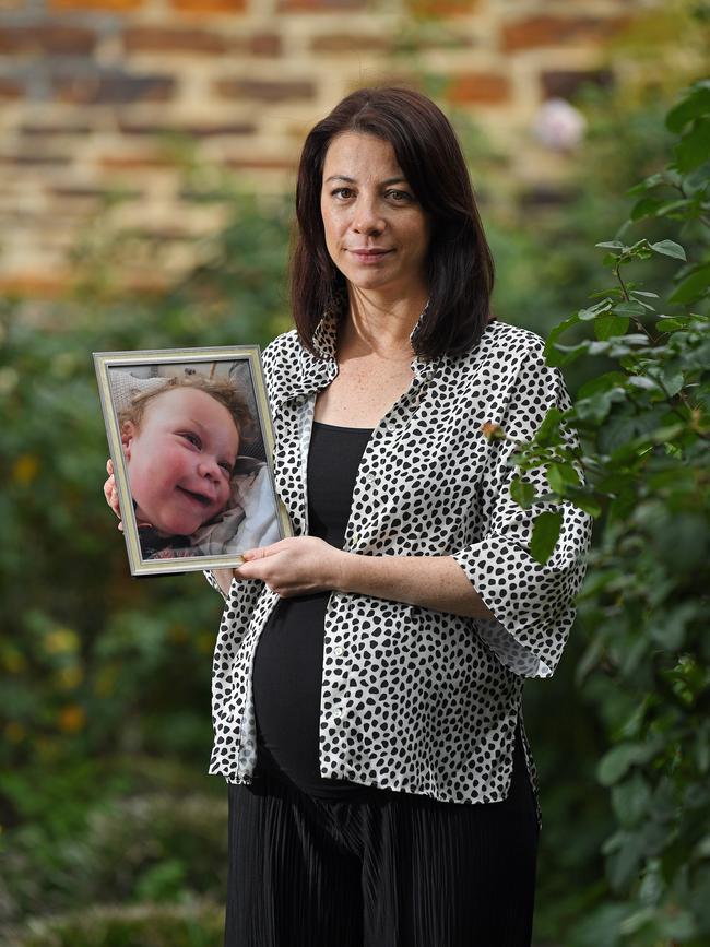 Anna Pak Poy with a photo of baby Sebby. Picture: Tom Huntley