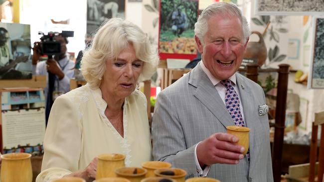 Prince Charles and Camilla sample the wares at a chocolate factory in St George’s, Grenada. Picture: Getty Images